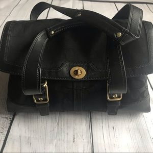 COACH Bag Black with Leather and fold-over top.